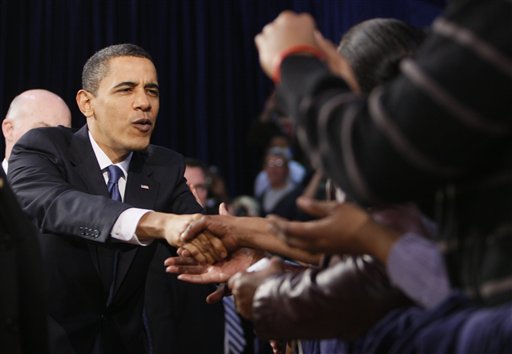 President Barack Obama greets the audience before he speaking about health care reform at Arcadia University in Glenside, Pa., Monday, March 8, 2010. (AP Photo/Charles Dharapak) (AP)
