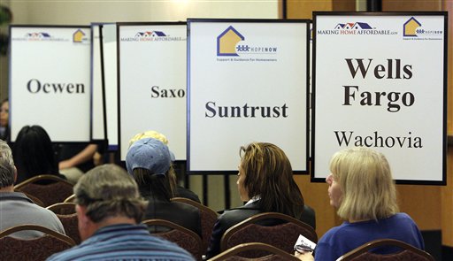 Hundreds of Arizona homeowners came to meet with housing counselors and representatives from major lenaders, Thursday, March 11, 2010, in Glendale, Ariz. The outreach event was organized by federal agencies under the Obama Administration's Making Home Affordable program. (AP Photo/Ross D. Franklin) (AP)