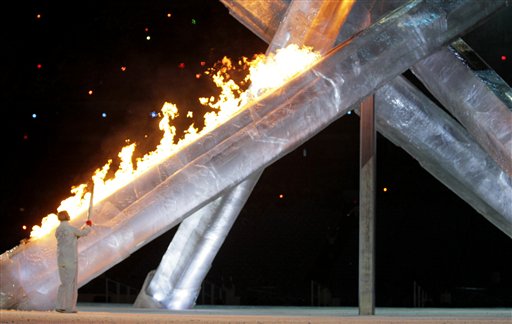 Canadian speed skater Catriona Le May Doan lights the Olympic Cauldron during the closing ceremony for the Vancouver 2010 Olympics in Vancouver, British Columbia, Sunday, Feb. 28, 2010. (AP Photo/Jae C. Hong) (AP)