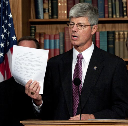 Rep. Bart Stupak, D-Mich., announces he will vote to pass the health care reform bill after President Obama agreed to sign an executive order reaffirming the ban on the use of federal funds to provide abortions as the house prepares to vote on health care reform in the U.S. Capitol in Washington, Sunday, March 21, 2010. (AP Photo/Harry Hamburg) (AP)