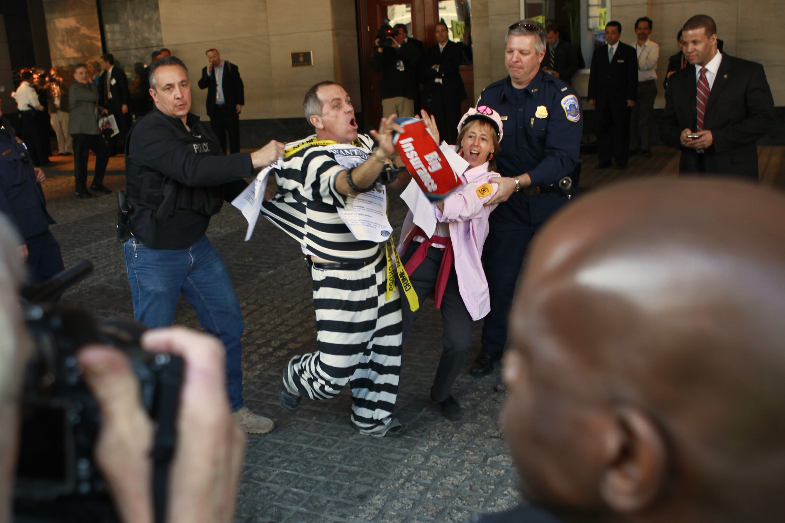during a protest for health care reform and against insurance companies, outside the Ritz-Carlton Hotel, where insurance companies were having a meeting, in Washington, on Tuesday, March 9, 2010. (AP Photo/Jacquelyn Martin) (Jacquelyn Martin)