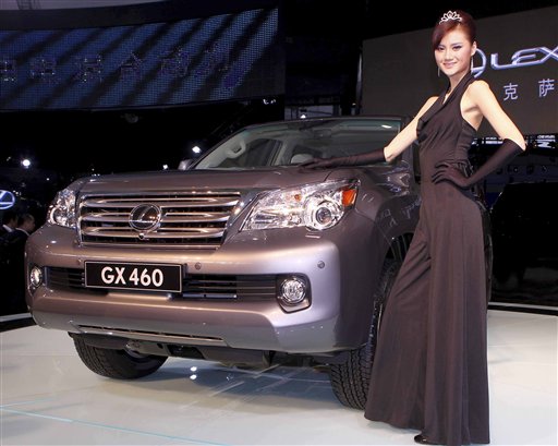 FILE -- In a Nov. 23, 2009 file photo released by the Xinhua news agency, a model presents a Lexus GX460 car during the 7th China International Automobile Exhibition in Guangzhou, Guangdong province, China.  Consumer Reports has given the Lexus GX460 a rare "Don't Buy" warning, saying a problem that occurred during routine handling tests could lead the SUV to roll over in real-world driving. (AP Photo/Xinhua, Chen Jianli/file)  ** NO SALES ** (AP)