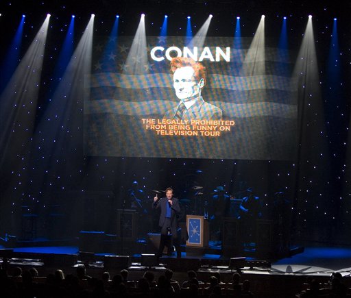 Former The Tonight Show host Conan OBrien performs at the Hult Center for the Performing Arts in Eugene, Ore., Monday, April 12, 2010.  OBrien, who quit the show rather than host it at 12:05 a.m. after the return of Jay Leno to late night television, is kicking off his The Legally Prohibited from Being Funny on Television Tour in Eugene. O'Brien is expected to return to television in November on cable station TBS.(AP Photo/Don Ryan) (AP)