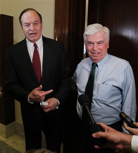 Senate Banking Committee Chairman Christopher Dodd, D-Conn., right, and the committee's ranking Republican Sen. Richard Shelby, R-Ala., emerge from a meeting on Capitol Hill in Washington, Monday, April 26, 2010, ahead of a crucial test vote for the financial reform bill. (AP Photo/Charles Dharapak) (AP)