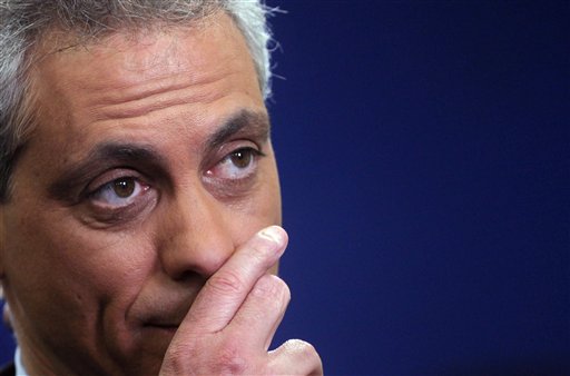 FILE - In this April 29, 2009, file photo, White House Chief of Staff Rahm Emanuel speaks during a television interview at the White House. No-drama Obama was bound to get fireworks for choosing the expletive-spewing, hotheaded, never-at-rest Rahm Emanuel to be his White House chief of staff. The only question was when _ and how big. (AP Photo/Ron Edmonds, File) (AP)