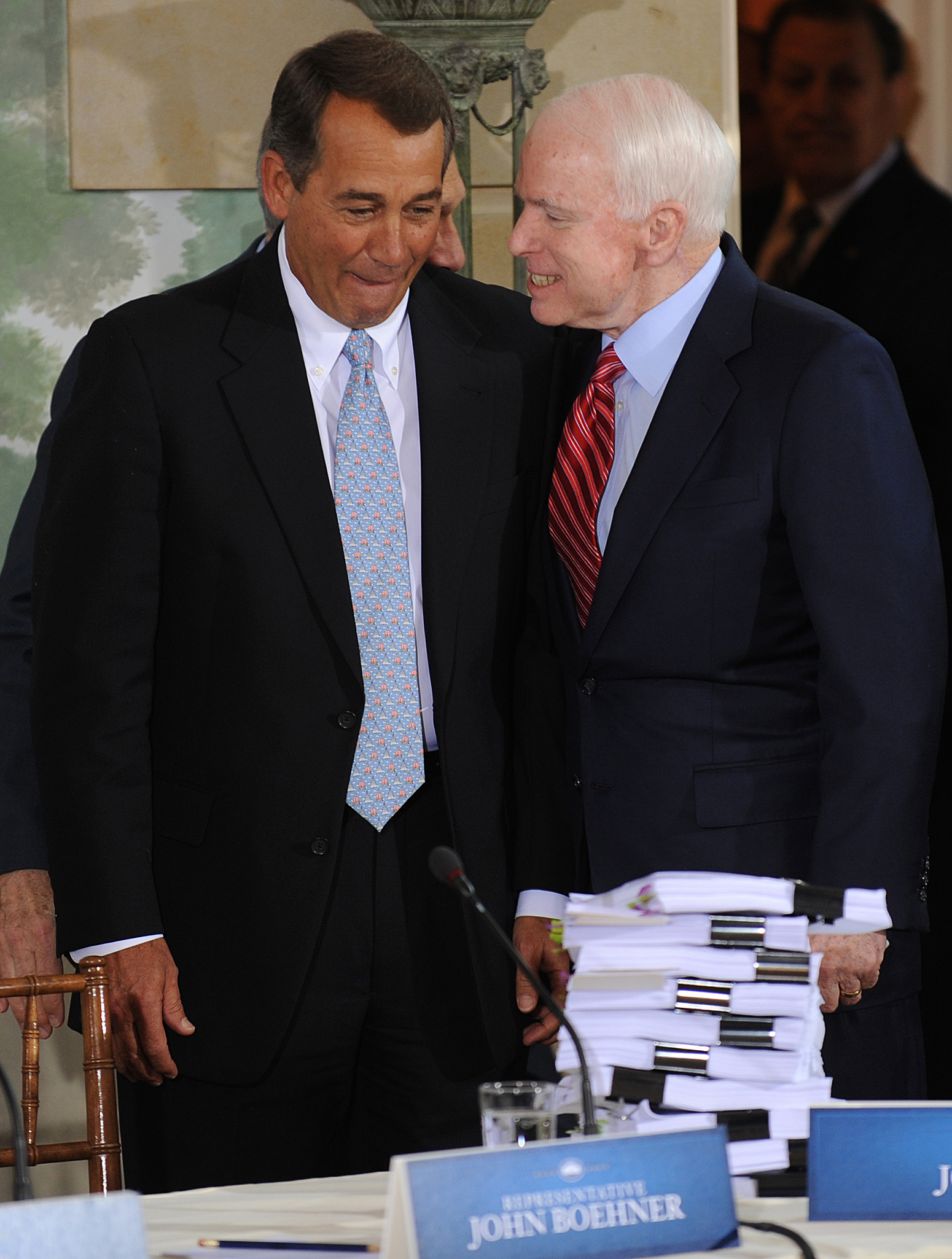 US Republican Congressman from Ohio John Boehner(L) talks with  US Republican Senator from Arizona John McCain (R) prior to US President Barack Obama's opening remarks at a bipartisan meeting to discuss health reform legislation at the Blair House in Washington, DC USA 25 February 2010. President Obama is hosting a televised health care summit with Republican and Democratic lawmakers in efforts to craft healthcare overhaul legislation. (Pool)