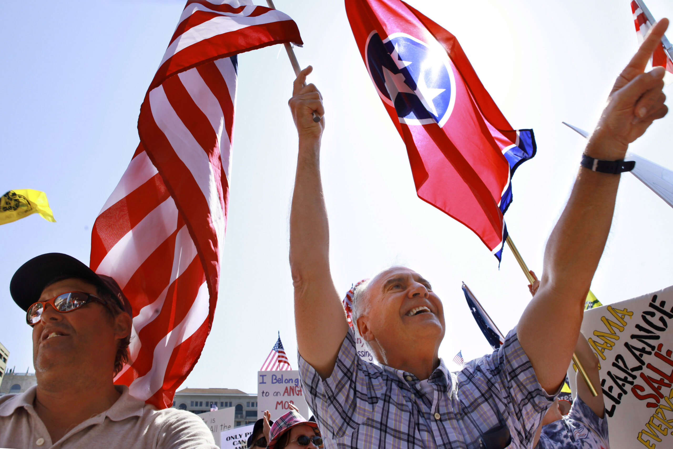 David Corcoran of Orlando, Fla., left, and Henry Massery, of Elgin, Illi., attend a tea party protest in Washington, Thursday, April 15, 2010. (AP Photo/Jacquelyn Martin) (Associated Press)