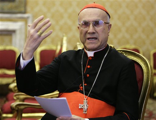 FILE - In this Tuesday, April 8, 2008 file photo Vatican Secretary of State Cardinal Tarcisio Bertone speaks during an interview by the Associated Press, at the Vatican. The Vatican on Wednesday, April 13, 2010 moved to defuse growing anger over remarks by the pope's top aide that the "problem'' behind the pedophile priest scandals is homosexuality and not to the church's celibacy requirement for clergy. Cardinal Bertone, the Holy See's No. 2 official as secretary of state, prompted an outpouring of irate words from advocacy groups for gays, politicians and even the French government, which portrayed his remarks earlier in this week in Chile as an affront to human rights. (AP Photo/Andrew Medichini, file) (Associated Press)