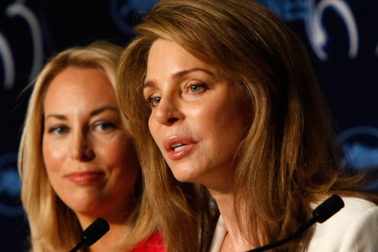 Queen Noor of Jordan speaks during a press conference in Cannes for the film "Countdown To Zero", as former CIA agent Valerie Plame Wilson looks on.