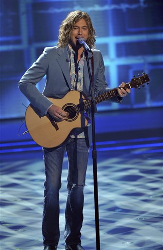 In this publicity image released by Fox, contestant Casey James performs on the singing competition series, "American Idol," on Tuesday, May 18, 2010, in Los Angeles. (AP Photo/Fox, Michael Becker) (AP)