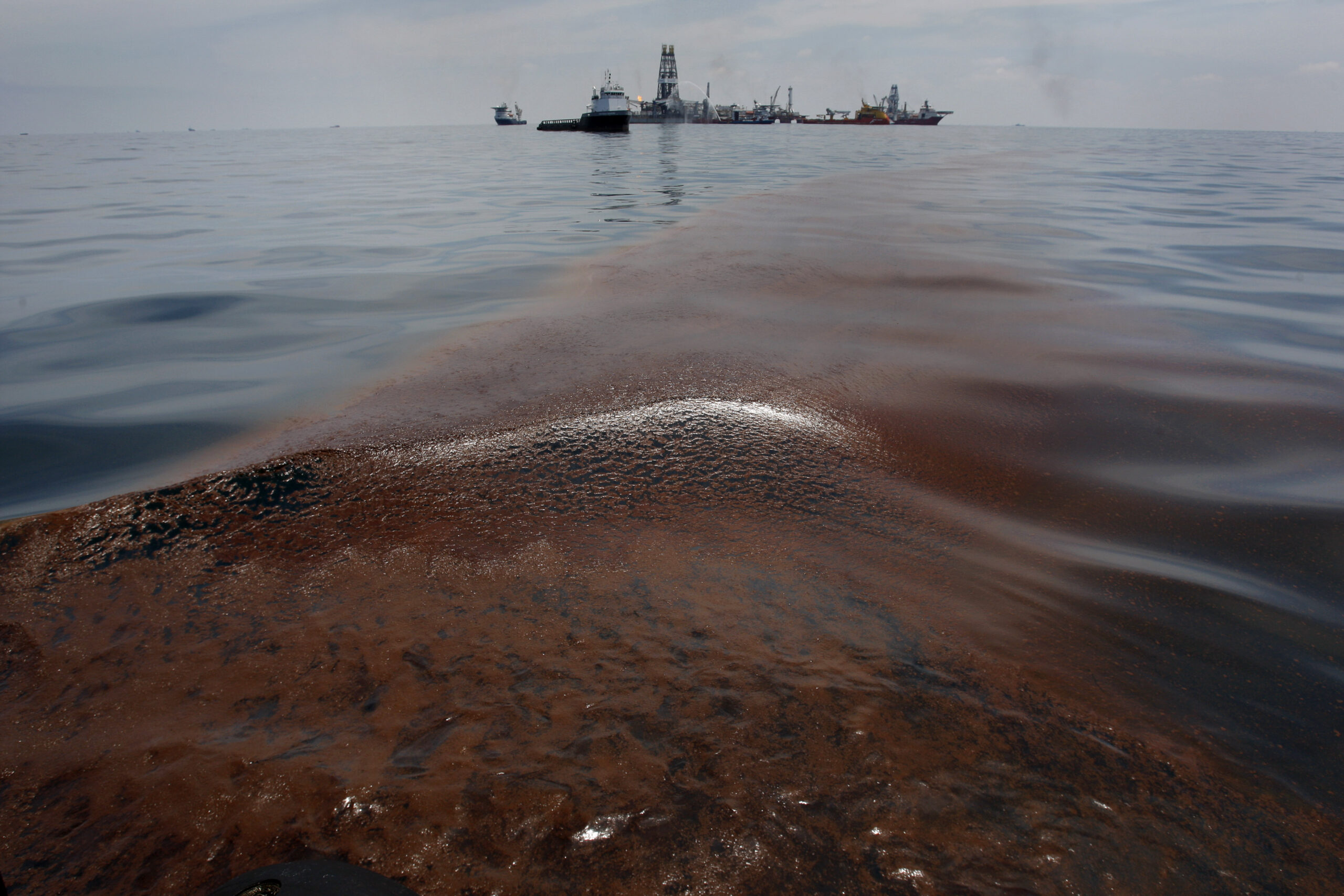 Dispersed oil floats on the surface of the Gulf of Mexico waters close to the site of the BP oil spill. (Reuters/Hans Deryk)
