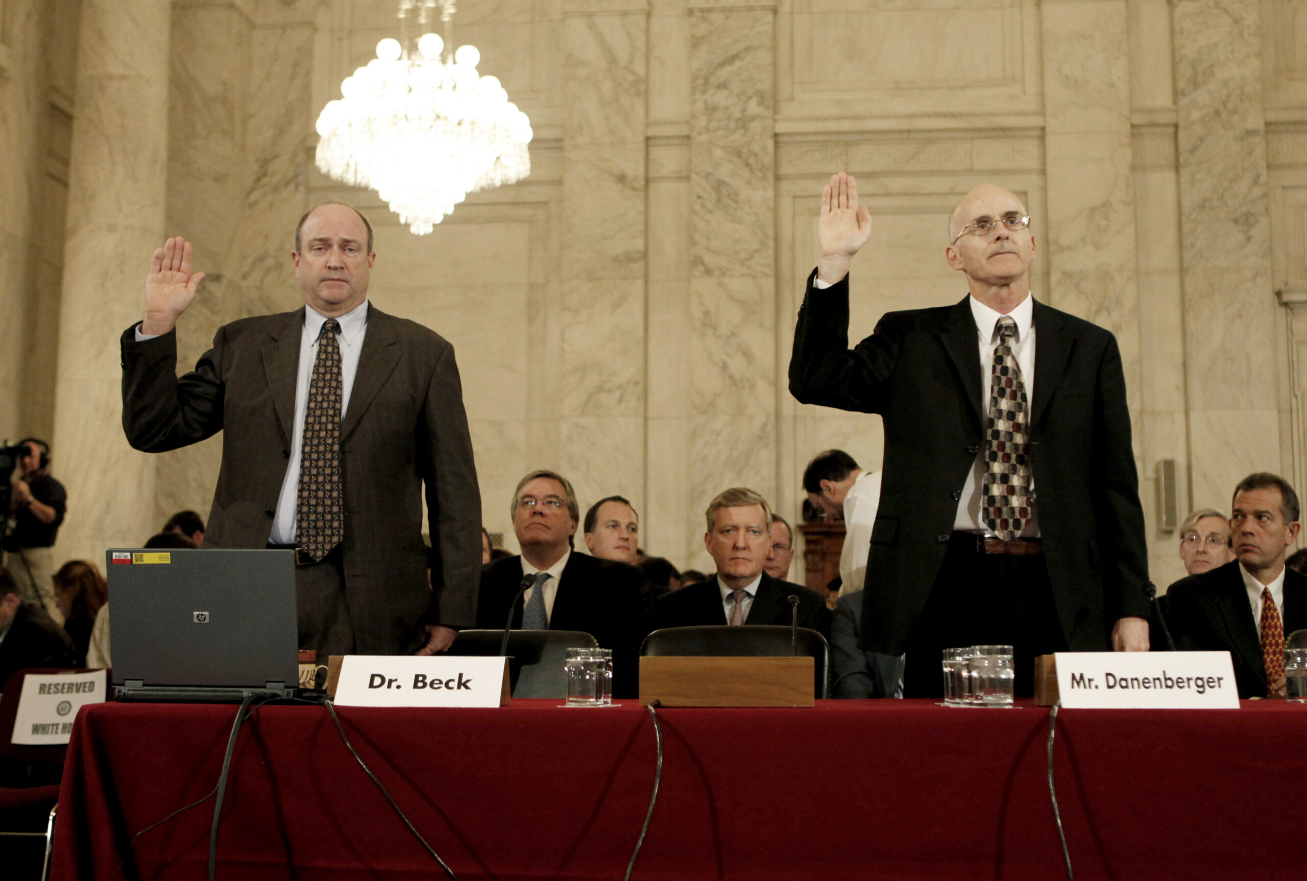 Dr. F.E. Beck, left, Associate Professor Texas A&M University, and Elmer Danenberger, right, Former Chief Offshore Regulatory Program Minerals Management Services are sworn-in befre they testify at the Senate Committee on Energy and Natural Resources, on Capitol Hill  in Washington Tuesday, May 11, 2010. (AP Photo/Pablo Martinez Monsivais) (Associated Press)