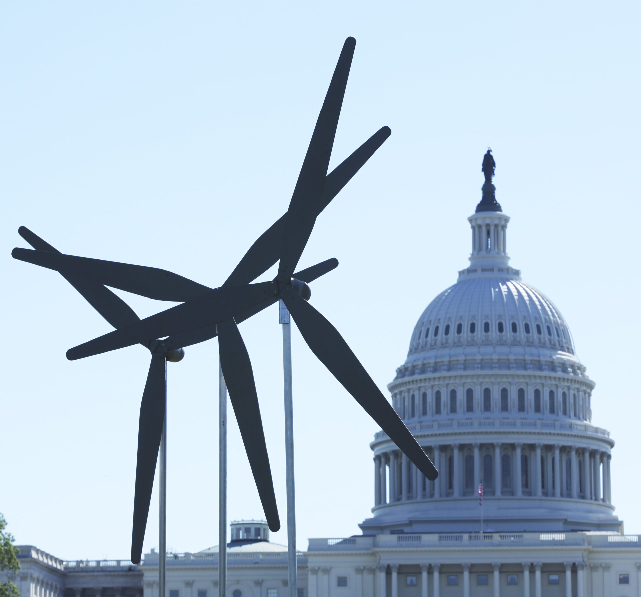 Windmills replicas to symbolize clean energy, erected by Greenpeace are seen near the Capitol in Washington, Wednesday, May 5, 2010,  to protest the oil spill in the Gulf and call on President Barack Obama and the Congress to stop plans for any new offshore drilling.   (AP Photo/Manuel Balce Ceneta) (Associated Press)