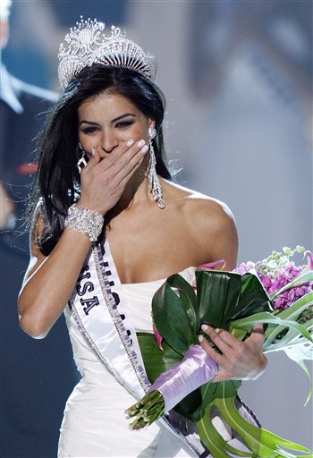 Miss Michigan Rima Fakih reacts as she is crowned Miss USA 2010 Sunday, May 16, 2010 in Las Vegas. (AP Photo/Isaac Brekken) (AP)