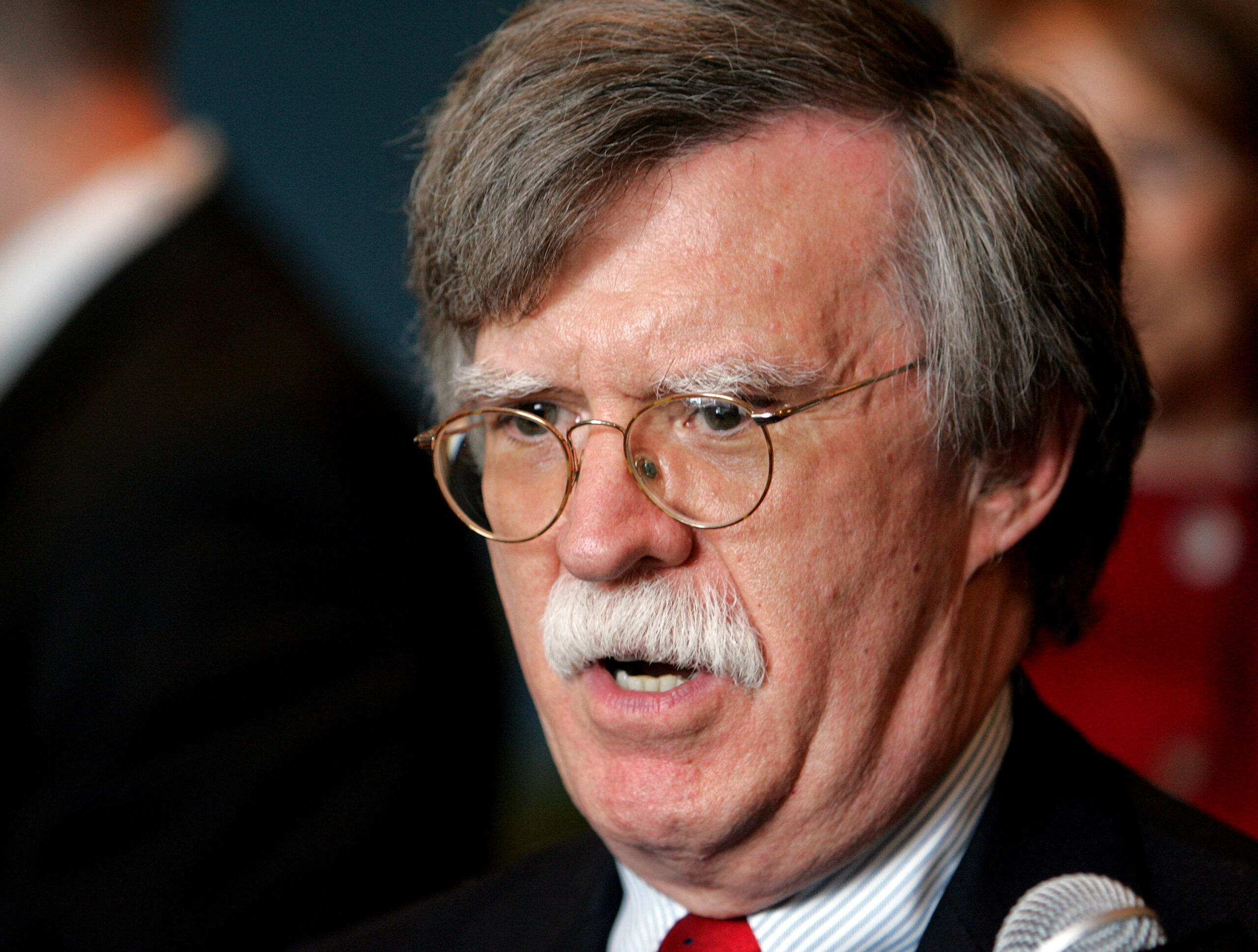 U.S. Ambassador to the United Nations John Bolton speaks to reporters during a lunch break from the voting of new non-permanent members of the Security Council outside the General Assembly at U.N. headquarters in New York October 16, 2006. REUTERS/Jeff Zelevansky (UNITED STATES) (Reuters)