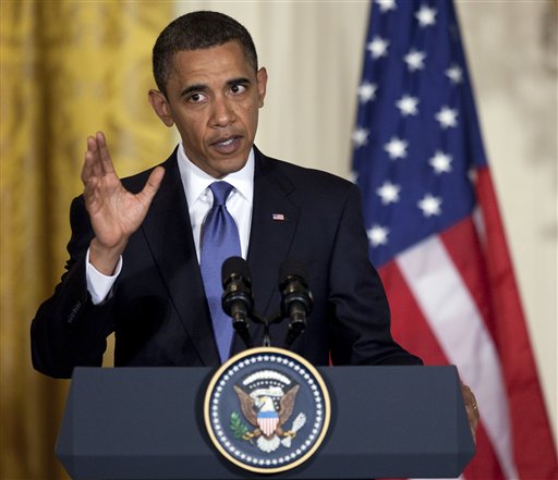 President Barack Obama gestures during a news conference with Afghanistan's President Hamid Karzai in the East Room of the White House on Wednesday, May  12, 2010 in Washington. (AP Photo/Evan Vucci) (AP)