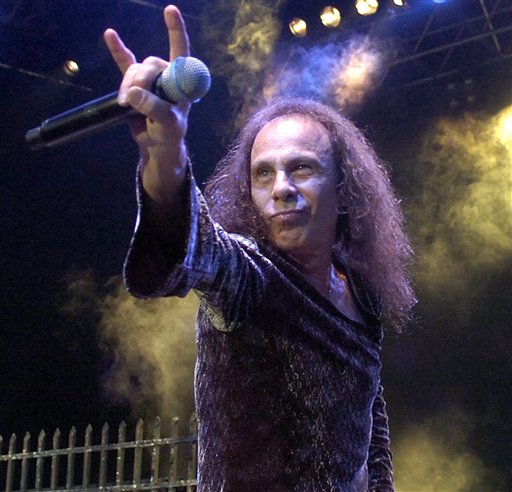 FILE - In this July 7, 2007 file photo, Ronnie James Dio performs with British heavy metal group "Heaven and Hell" during the 41th Montreux Jazz Festival in Montreux, Switzerland. Dio, the metal god who replaced Ozzy Osbourne in Black Sabbath and later piloted the bands Heaven & Hell and Dio, died Sunday, May 16, 2010, according to his wife and manager. He was 67. (AP Photo/Keystone, Sandro Campardo, File) (AP)