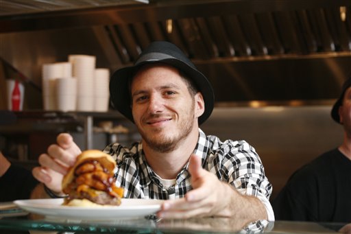 This undated photo provided by Joe Shymanski for Good Stuff Eatery shows chef Spike Mendelsohn at Good Stuff Eatery in Washington.  Mendelsohn's Washington burger joint, Good Stuff Eatery, has become a hotspot.    (AP Photo/Good Stuff Eatery, Joe Shymanski)  NO SALES (AP)