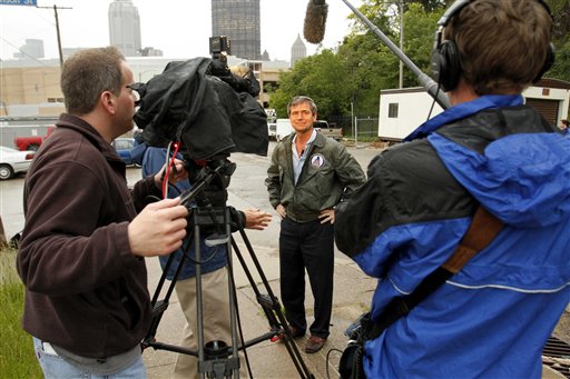 ** ADDS INFORMATION ON TUESDAY'S PRIMARY ** U.S. Rep. Joe Sestak, D-Pa, center, is interviewed outside the Consol Energy Center construction site in downtown Pittsburgh, Monday, May 17, 2010. Sestak is in a close race in Tuesday's Democratic primary with Sen. Arlen Specter. (AP Photo/Gene J. Puskar) (AP)