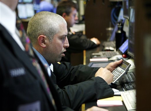 A broker works the numbers at his post on the trading floor of the New York Stock Exchange Tuesday, May 4, 2010, in New York. Stocks plunged around the world Tuesday as fears spread that Europe's attempt to contain Greece's debt crisis would fail. (AP Photo/David Karp) (AP)