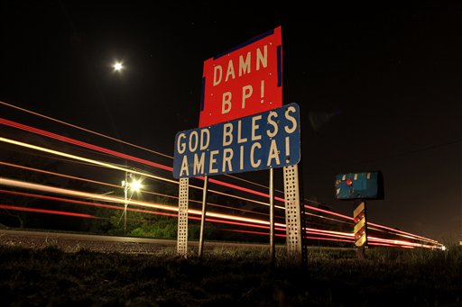 A sign chastising BP is seen along a highway south of Belle Chasse, La. Thursday, May 20, 2010. One month after the BP's Deepwater Horizon oil rig explosion, oil continues to leak into the Gulf of Mexico and has begun washing onto Louisiana coastline. (AP Photo/Charlie Riedel) (AP)