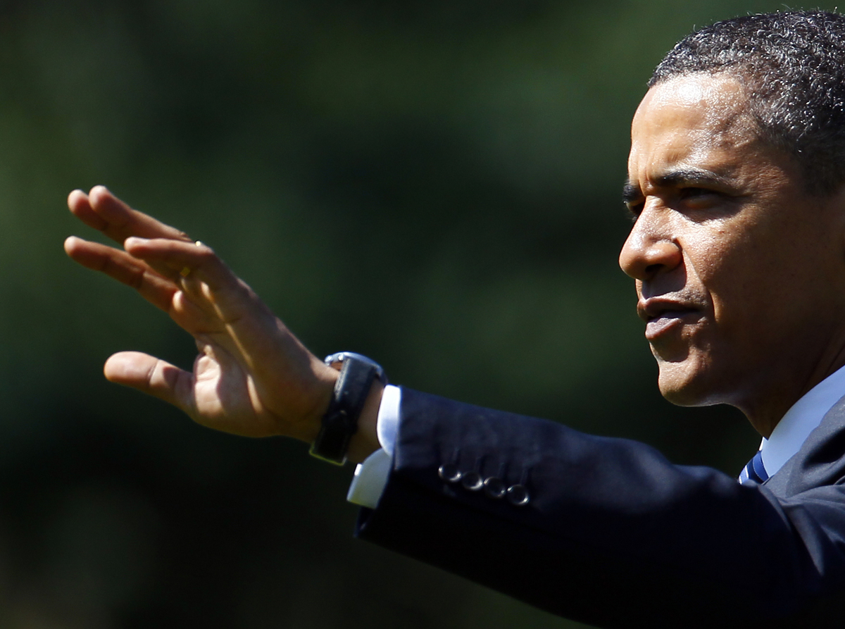 President Barack Obama waves to visitors on the South Lawn of the White House in Washington, Friday, June 18, 2010. as he walks to Marine One to travel to Ohio. (AP Photo/Carolyn Kaster) (Carolyn Kaster)