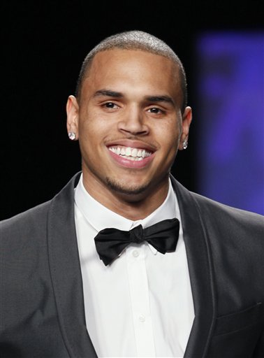 FILE - In this Feb. 12, 2010 file photo, Chris Brown models at Naomi Campbell's Fashion For Relief - Haiti fashion benefit, shown during Fashion Week in New York. (AP Photo/Stuart Ramson, file) (AP)