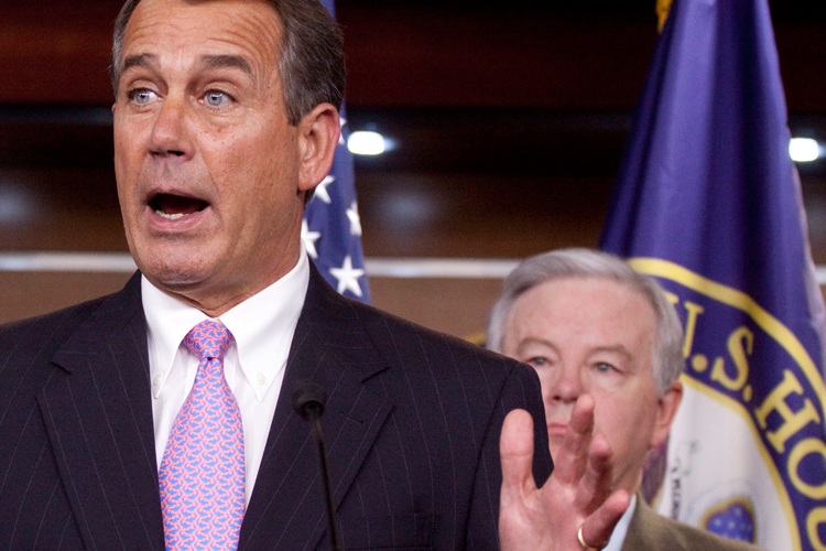 House Minority Leader John Boehner (R-Ohio) and Rep. Joe Barton (R-Texas) during a news conference on March 2.