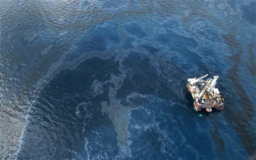 Oil surrounds the site of the Deepwater Horizon oil spill in the Gulf of Mexico near the coast of Louisiana, Monday, May 31, 2010. (AP Photo/Jae C. Hong) (AP)