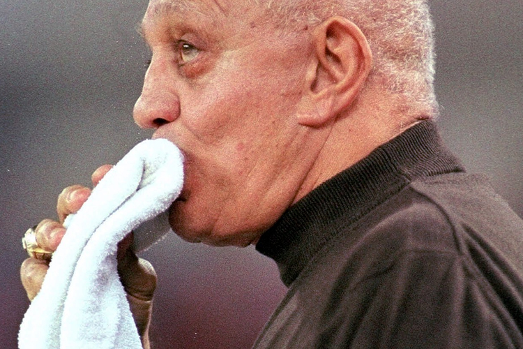 Jerry Tarkanian chews on a towel in 1998.