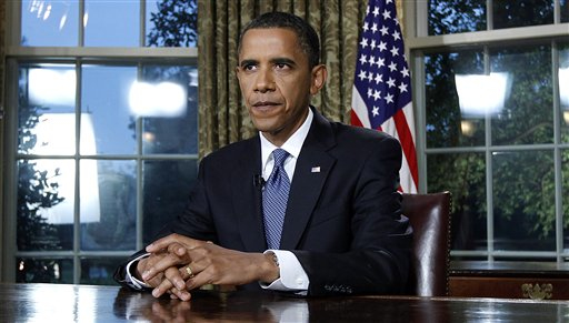 President Barack Obama is photographed after delivering a televised address from the Oval Office of the White House in Washington, Tuesday June 15, 2010. President Obama said the nation will continue to fight the oil spill in the Gulf of Mexico for "as long as it takes." (AP Photo/Alex Brandon) (AP)