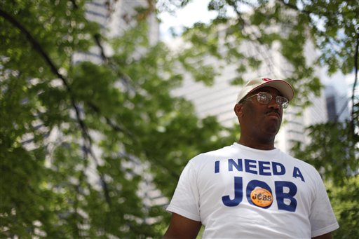 In this June 23, 2010 photo, Frank Wallace, who has been unemployed since May of 2009, is seen during a rally organized by the Philadelphia Unemployment Project, in Philadelphia. Initial claims for jobless benefits fell by the largest amount in two months last week, but remain above levels consistent with healthy job growth. (AP Photo/Matt Rourke) (AP)