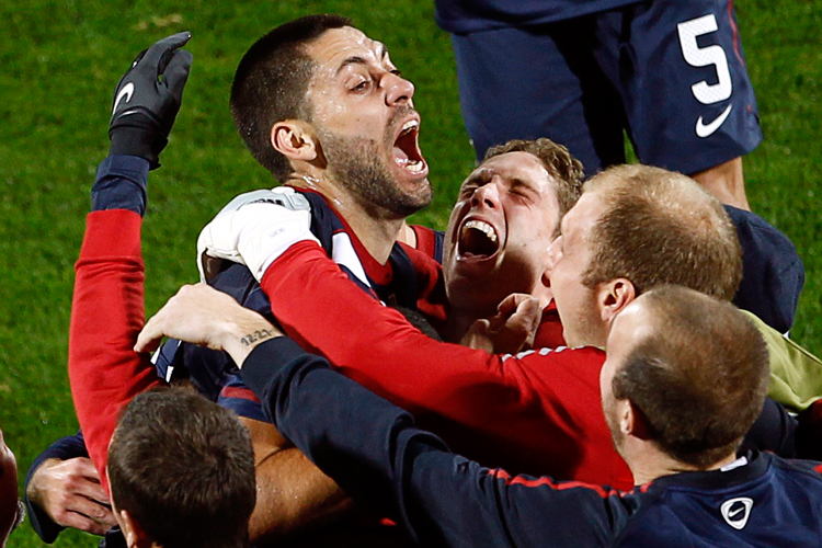 The US team celebrates after scoring during a 2010 World Cup match against England