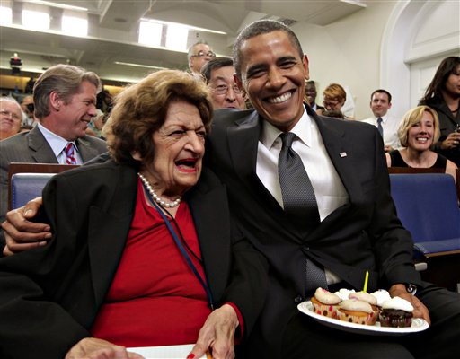 ** PROVIDES ALTERNATE CROP OF DCSA101 ** President Barack Obama, marking his 48th birthday, takes a break from his official duties to bring birthday greetings to veteran White House reporter Helen Thomas, left, who shares the same birthday and turns 89, Tuesday, Aug. 4, 2009, in the White House Press Briefing Room in Washington. Helen Thomas has covered every president since John F. Kennedy.  (AP Photo/J. Scott Applewhite) (Associated Press)
