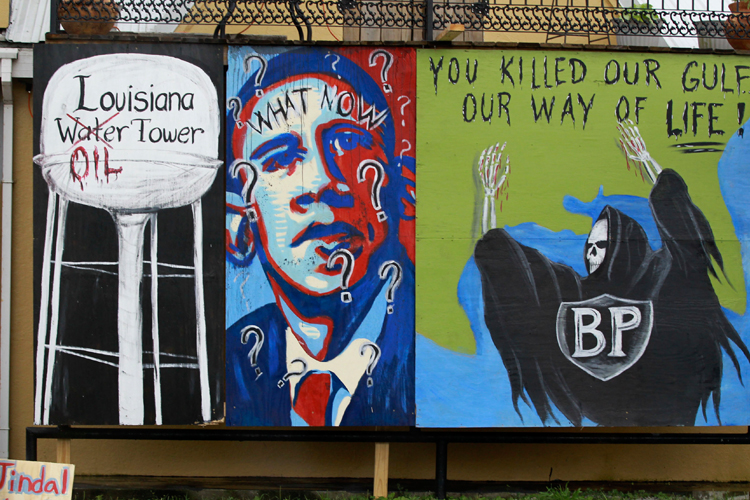 A wall painted with protest messages in Grand Isle, Louisiana.