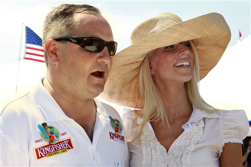 Tareq Salahi, left, and Michaele Salahi host the America's Polo Cup Championships by the National Mall in Washington, on Saturday, June 12, 2010.  (AP Photo/Jacquelyn Martin) (AP)