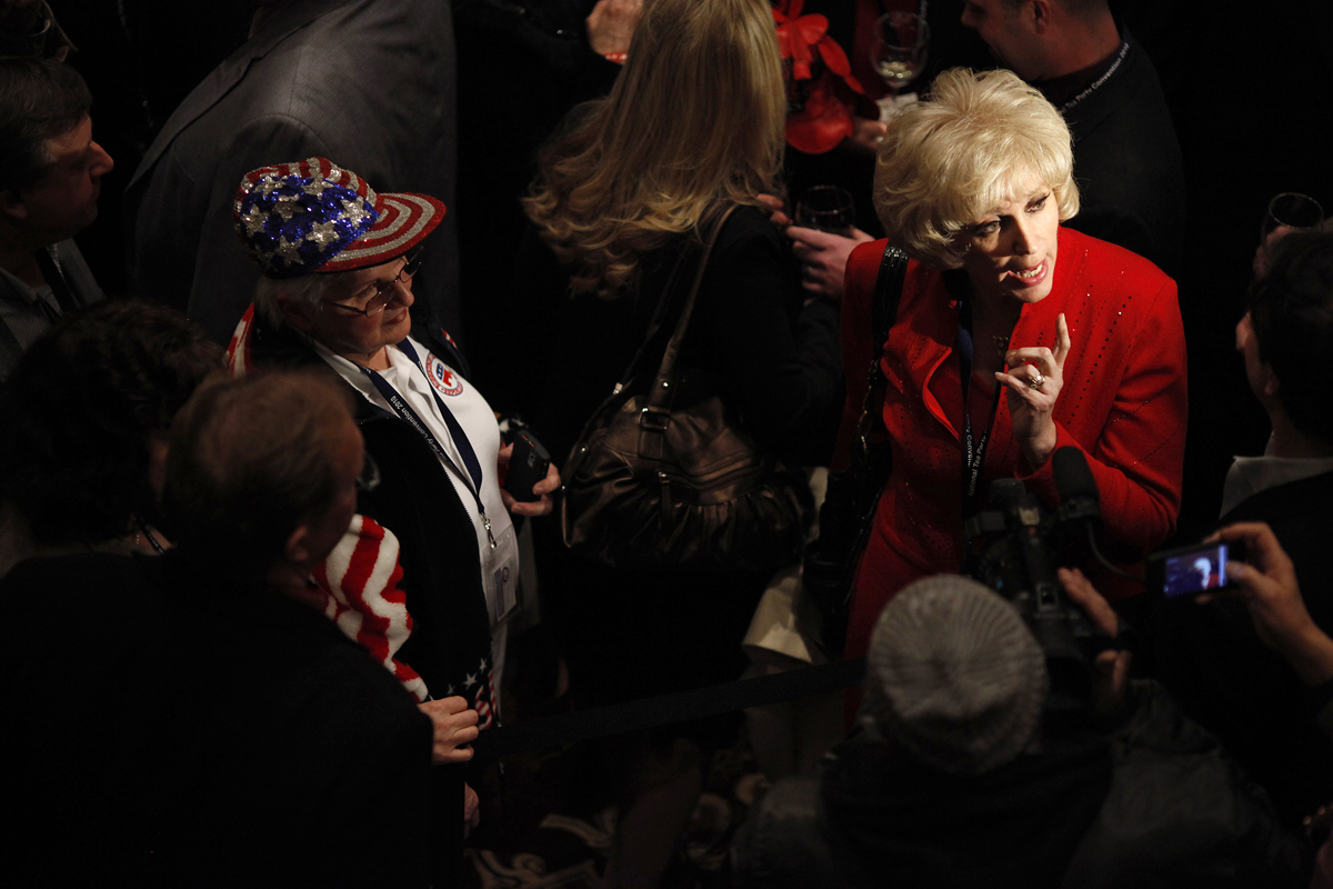 Orly Taitz (R) talks with reporters during the National Tea Party Convention at the Gaylord Opryland Hotel in Nashville, Tennessee,  February 6, 2010. REUTERS/Josh Anderson (UNITED STATES - Tags: POLITICS) (Â© Josh Anderson / Reuters)