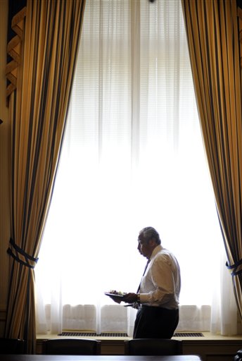 Rep. Charles Rangel, D-N.Y., takes his lunch to his seat in his office on Capitol Hill in Washington, Wednesday, May 26, 2010, during a meeting on how to care for US veterans with PTSD.  Just about everyone likes Charlie Rangel. Republicans pump his hand, Democrats put their arms around his shoulders and women of all political persuasions give him pecks on the cheek. (AP Photo/Cliff Owen) (AP)