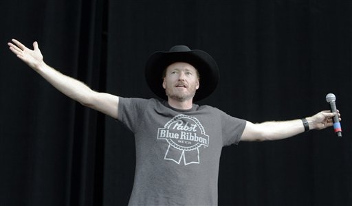 Comedian Conan O'Brien appears on stage at the Bonnaroo Music and Arts Festival in Manchester, Tenn. Saturday, June 12, 2010.  (AP Photo/Jeff Christensen) (AP)