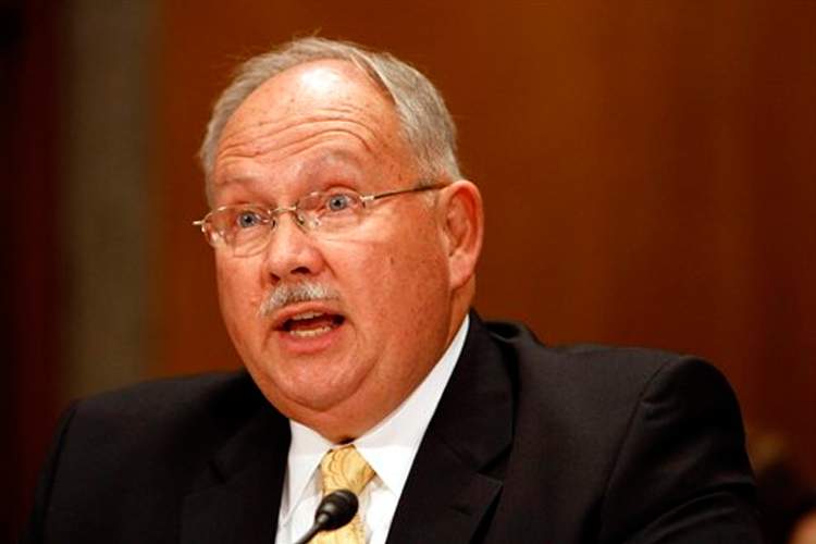 Former Arlington National Cemetery Superintendent John Metzler testifies in Washington on Thursday.
