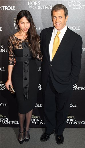 FILE - In this Feb. 4, 2010 file photo, Mel Gibson and Oksana Grigorieva arrive at the "Edge Of Darkness"  Premiere in Paris. (AP Photo/Jacques Brinon, file) (AP)