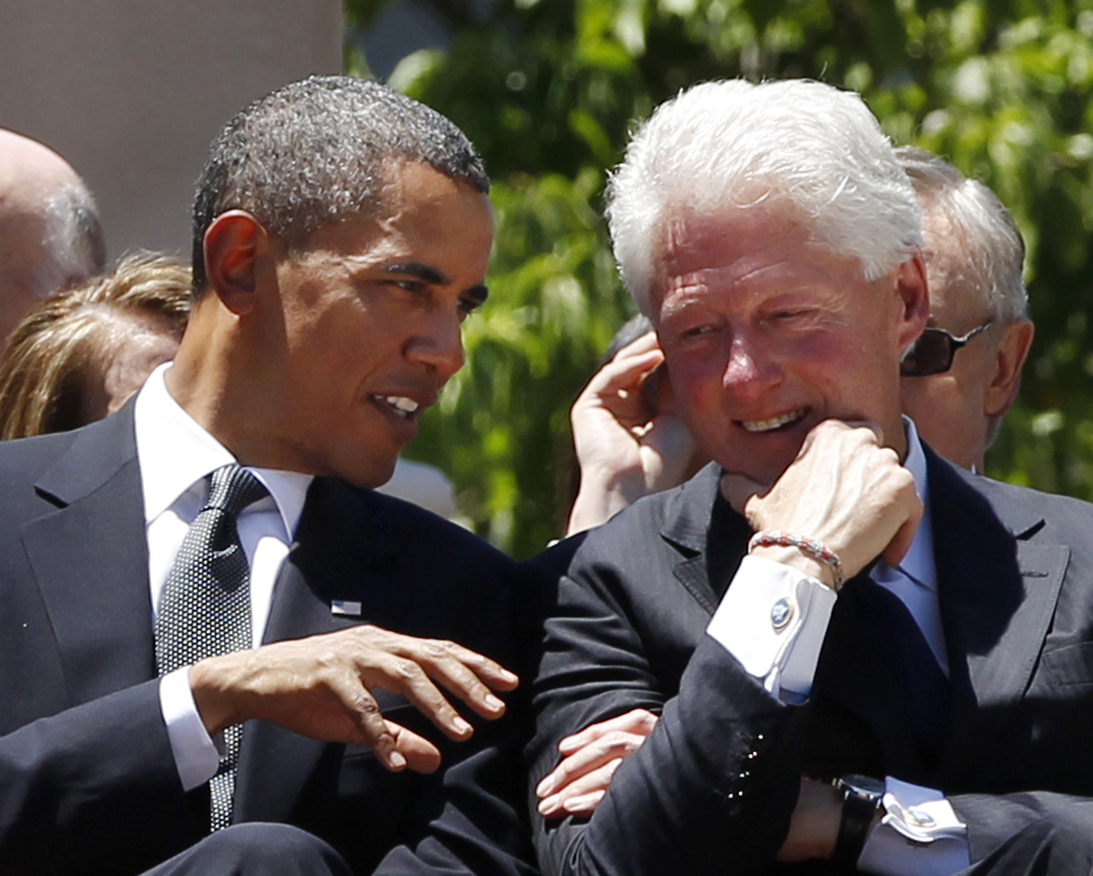 U.S. President Barack Obama and former president Bill Clinton attend the memorial service for Senator Robert Byrd on the steps of the state capitol in Charleston, West Virginia, July 2, 2010.         REUTERS/Larry Downing (UNITED STATES - Tags: POLITICS) (Â© Larry Downing / Reuters)