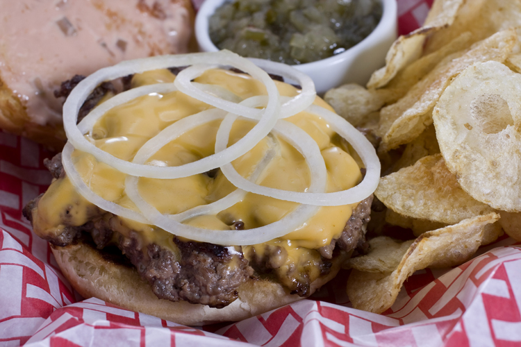Chris Kimball's old-fashioned burger with classic sauce is seen in this May 2, 2010 photo. Using coarsely ground sirloin steak and boneless beef short ribs makes this burger a winner.   (AP Photo/Larry Crowe) (Larry Crowe)
