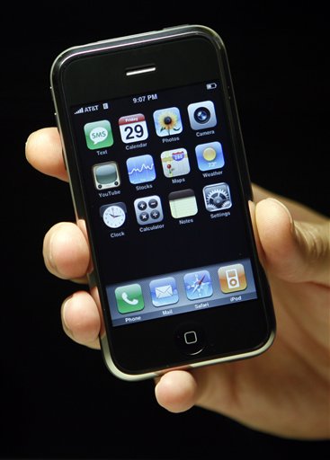 FILE - In this file photo taken June 29, 2010, the Apple iPhone 4 is shown at the Apple Store, in New York. A decision by Consumer Reports not to recommend the iPhone 4 because of reception issues could tarnish Apple Inc.'s reputation, but the snub isn't likely to dissuade fans who have braved poor reception for years.(AP Photo/Jason DeCrow, file) (AP)