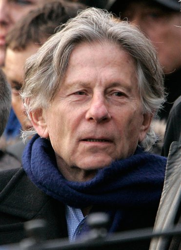 FILE - In this is Jan. 15, 2009 file photo, film director Roman Polanski looks on in Montrouge, France. The Swiss government says it will make an announcement Monday July 12, 2010 about Roman Polanski's extradition to the United States for a 1977 sex case. The government says Justice Minister Eveline Widmer-Schlumpf will hold a news conference in the capital Bern at 2 p.m. (1200 GMT; 8 a.m. EDT) "on the matter of the Roman Polanski extradition decision."  (AP Photo/Michel Euler, File) (AP)