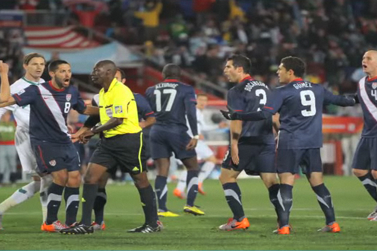 U.S. players protest a referee's call during their match against Slovenia at the World Cup on June 18.