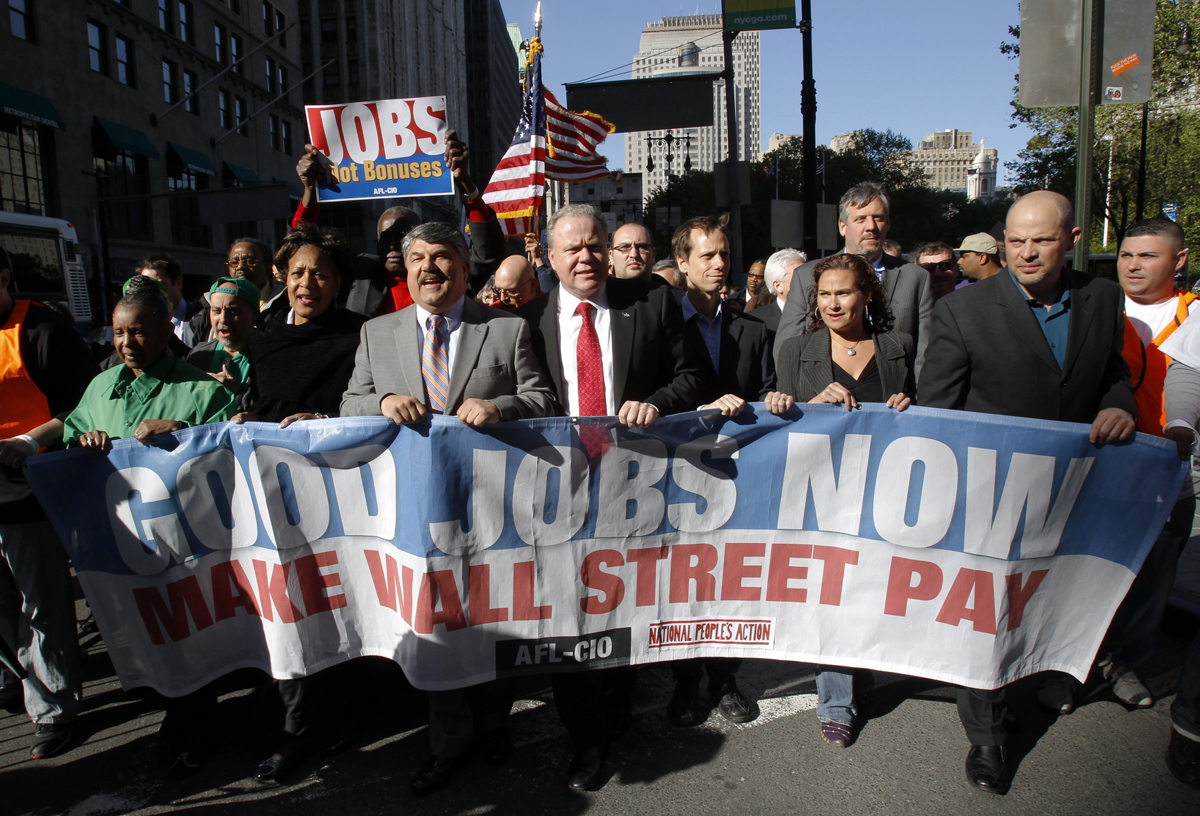AFL-CIO President Richard Trumka (3rd L) marches with Jack Ahern, President of the NYC Central Labor Council (3rd R) and other leaders at the head of the "Main Street to Wall Street" rally in New York, April 29, 2010. The AFL-CIO and other labor and community groups marched down Broadway through the financial district to protest against Wall Street banks.   REUTERS/Mike Segar   (UNITED STATES - Tags: BUSINESS CIVIL UNREST) (Â© Mike Segar / Reuters)