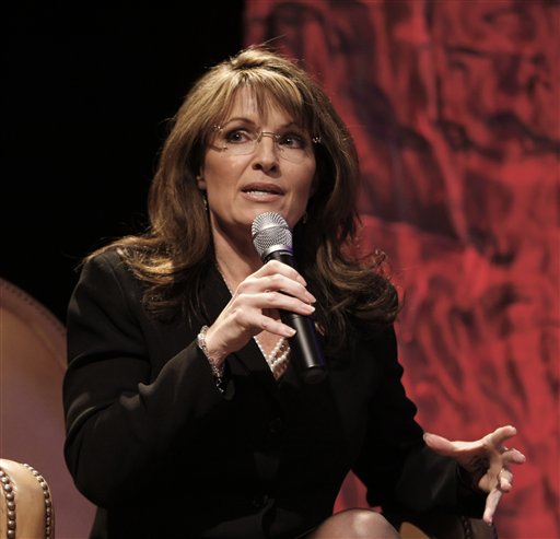 FILE - In this Feb. 6, 2010 photo, former vice presidential candidate Sarah Palin addresses attendees at the National Tea Party Convention in Nashville, Tenn. When the Tea Party Express pulls into the city where the conservative movement got its name, the crowd will be as notable for who is not there as who is. Palin is the keynote speaker on Wednesday, April 14, 2010, but Republican Sen. Scott Brown, whose January election the movement claims as its proudest accomplishment, is skipping the event. (AP Photo/Ed Reinke, File) (AP)