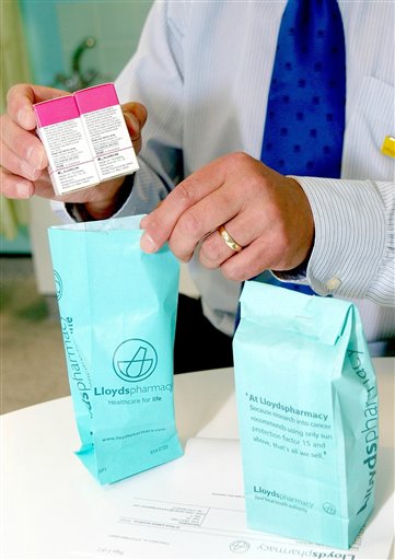 TO GO WITH MARIA CHENG STORY - A pharmacist prepares online medicine packets for shipment from a pharmacy in central London, Wednesday July 28, 2010. In Britain, an increasing number of websites are pushing the boundaries of online medicine, with at least a dozen sites offering consultations and medication most countries only allow during in-person visits - or remote ones with the help of a webcam or telephone call. The sites are completely legal, and fall under the jurisdiction of a regulator called the Care Quality commission. Not surprisingly, the most in-demand drugs are for erectile dysfunction, sexually transmitted diseases and hair loss.(AP Photo/Max Nash) (AP)