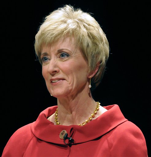 FILE - In this March 2, 2010 file pool photo, former World Wrestling Entertainment CEO Linda McMahon attends a debate with money manager Peter Schiff and former Congressmen Rob Simmons at the Lincoln Theater on the University of Hartford campus in West Hartford, Conn. The widow of a World Wrestling Entertainment performer who died in a 1999 stunt says she's suing the Connecticut-based company and its leaders, including Republican U.S. Senate candidate Linda McMahon. Martha Hart, widow of Owen Hart, plans to file her lawsuit Tuesday, June 22, 2010, in U.S. District Court in Hartford. (AP Photo/John Woike, Pool, File) (AP)